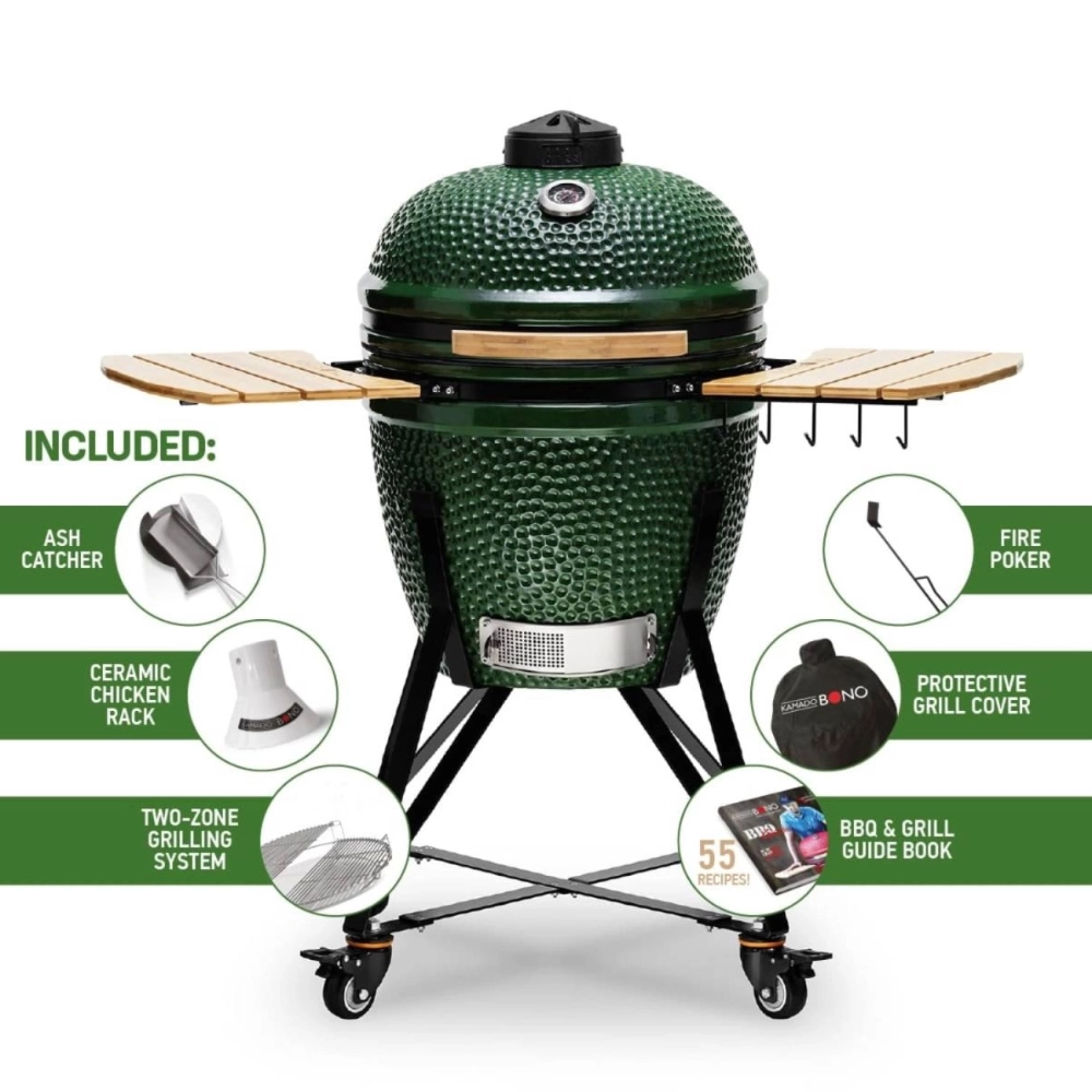 Green kamado barbecue grill with included outdoor cooking accessories