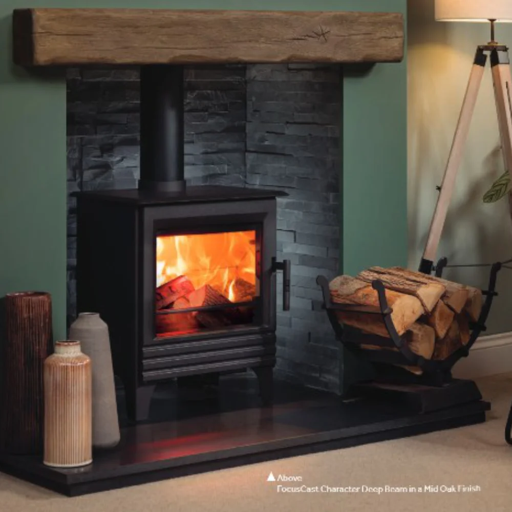 Traditional wood burning stove with a timber mantel and log storage